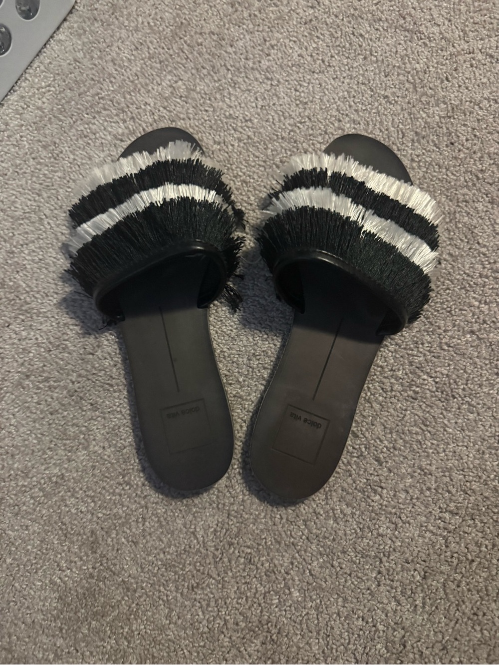 Dolce Vita Fringe Slide Sandals in Black and White